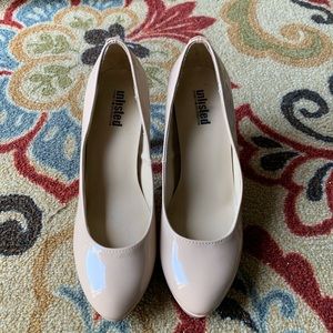 Nude 4 1/4” heels (3/4” platform). WORN ONCE